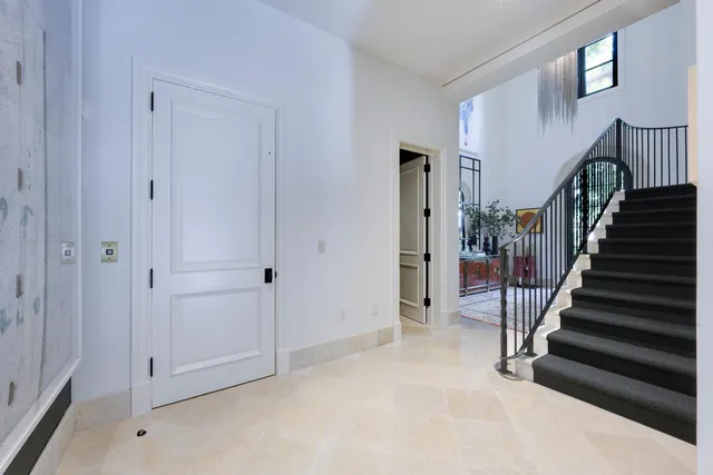 a view of an entryway with staircase