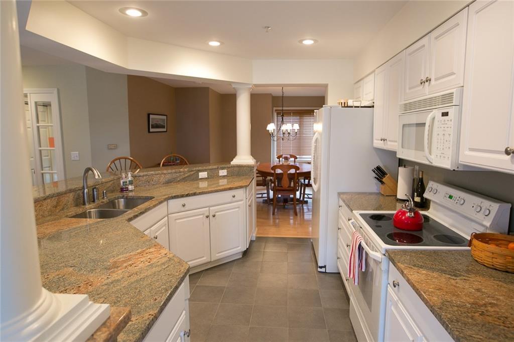 96 Locke Village Road, Unit I2 Newry, ME 04261 - Photo 7 of 34 View of Dining area from kitchen