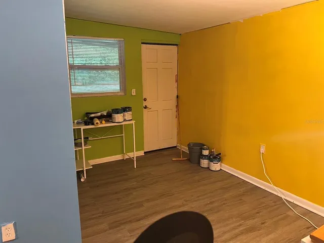 a bedroom with a bed and a closet