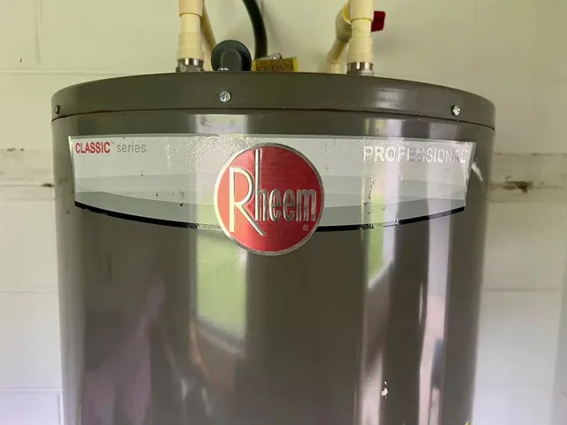 a sign on the wall next to a sink