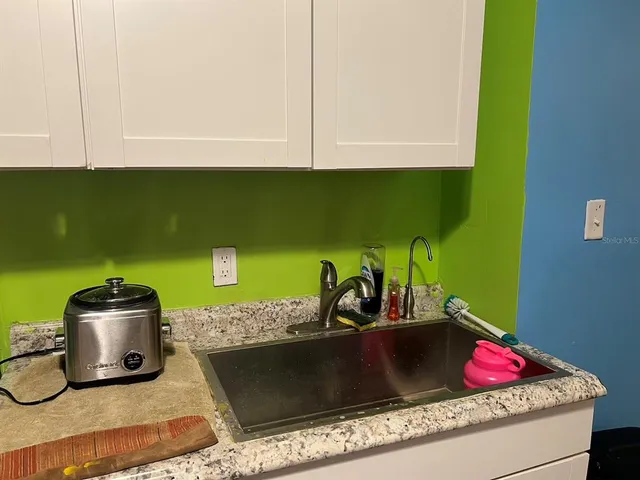 a room with storage and utility