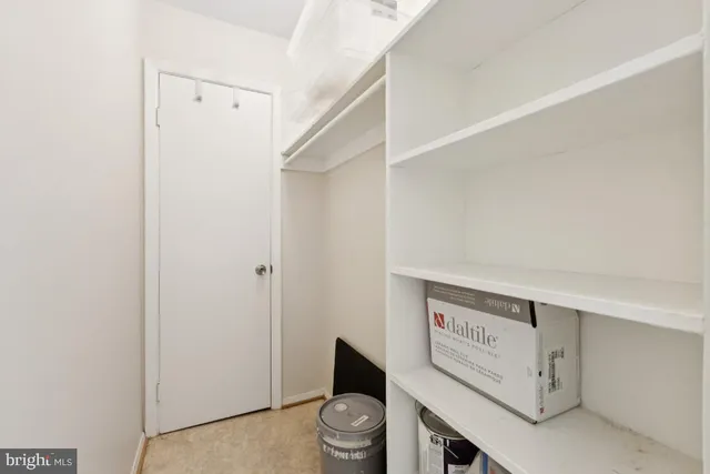 a bathroom with a sink a mirror and vanity