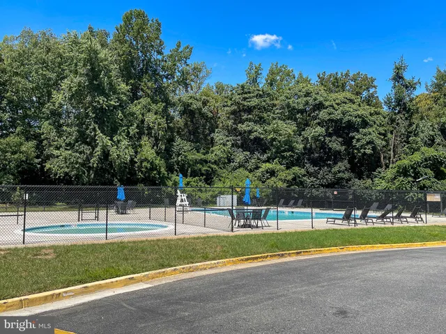 a view of a house with swimming pool