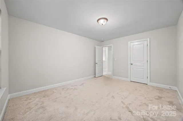 an empty room with an entryway