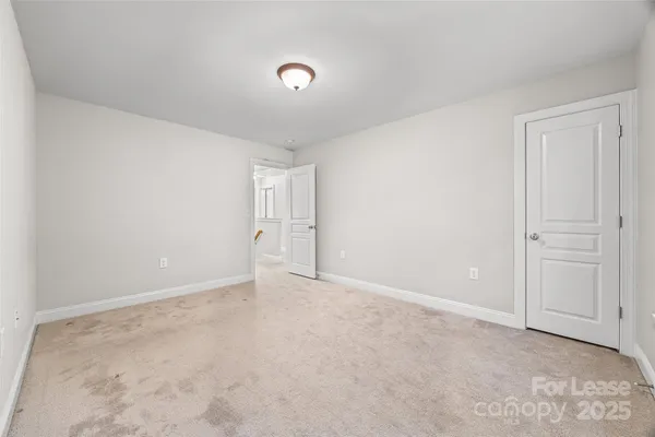 an empty room with an entryway