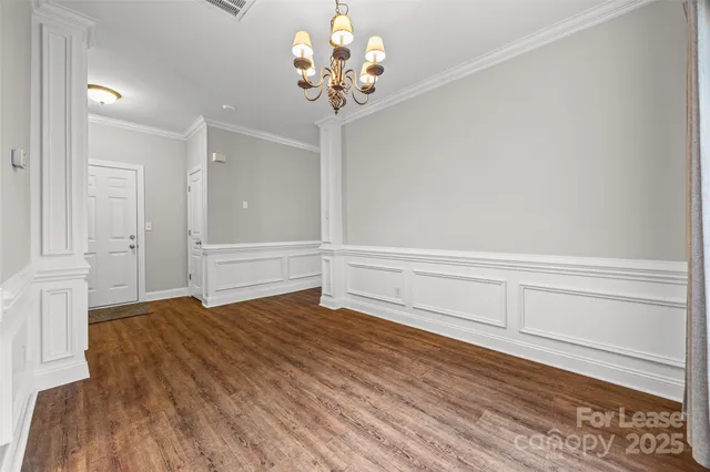 a view of room with window and ceiling fan