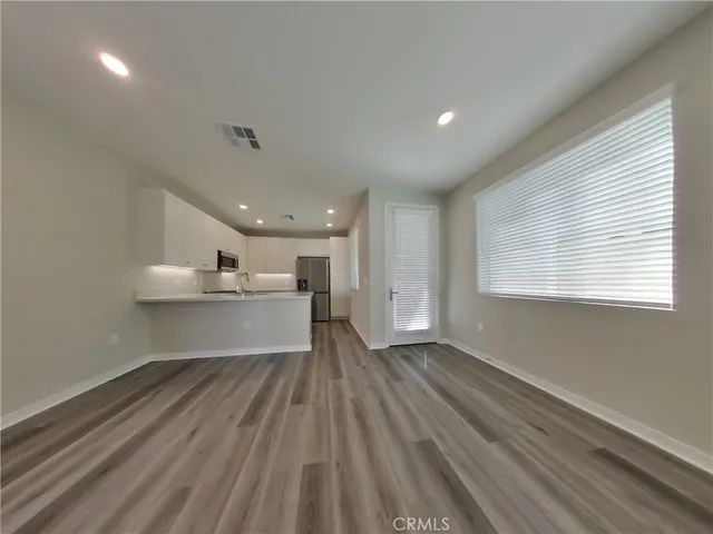 a view of kitchen and windows