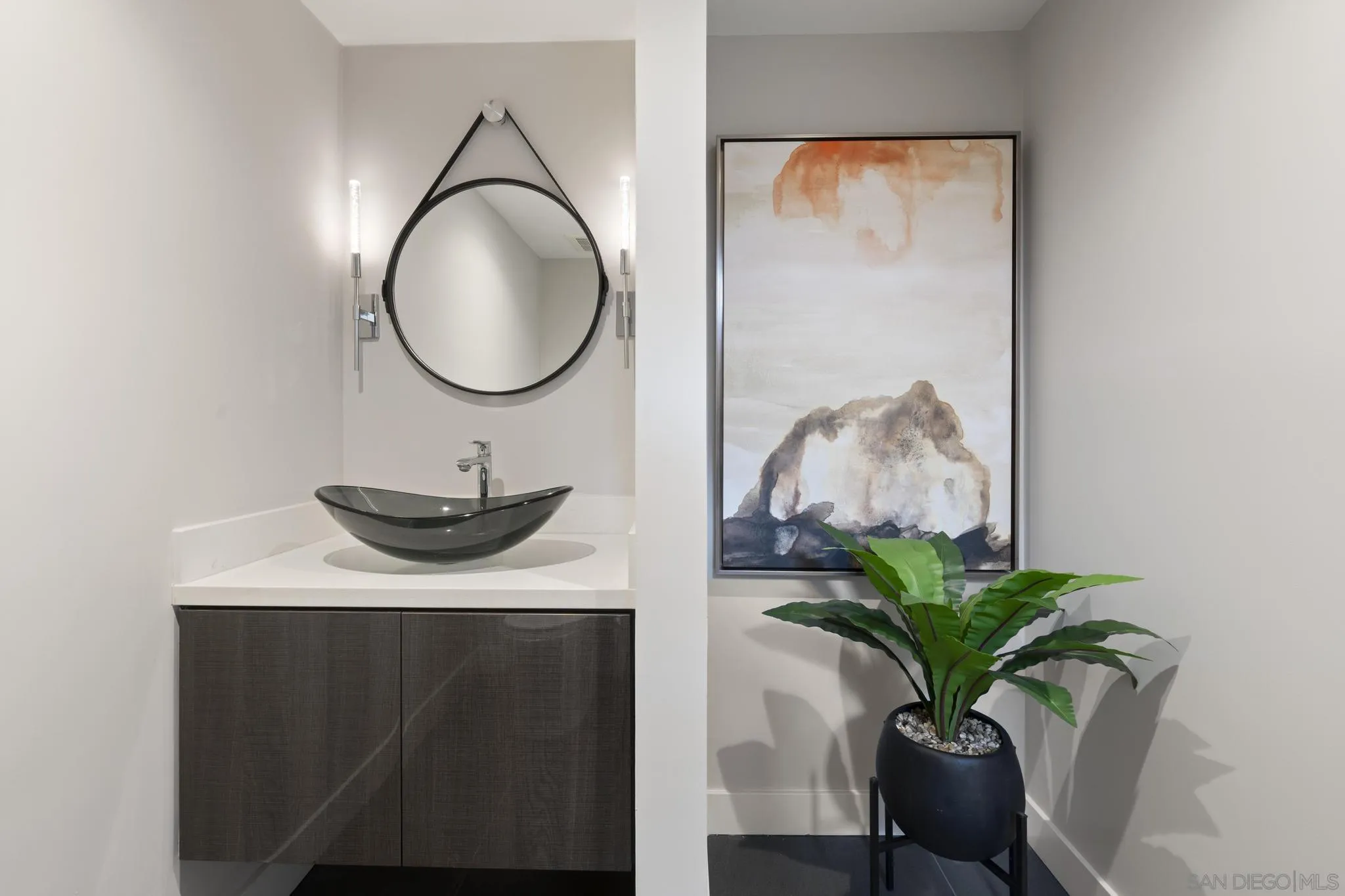 41 Blue Anchor Cay Road Coronado, CA 92118 - Photo 46 of 74 a bathroom with a sink and a mirror