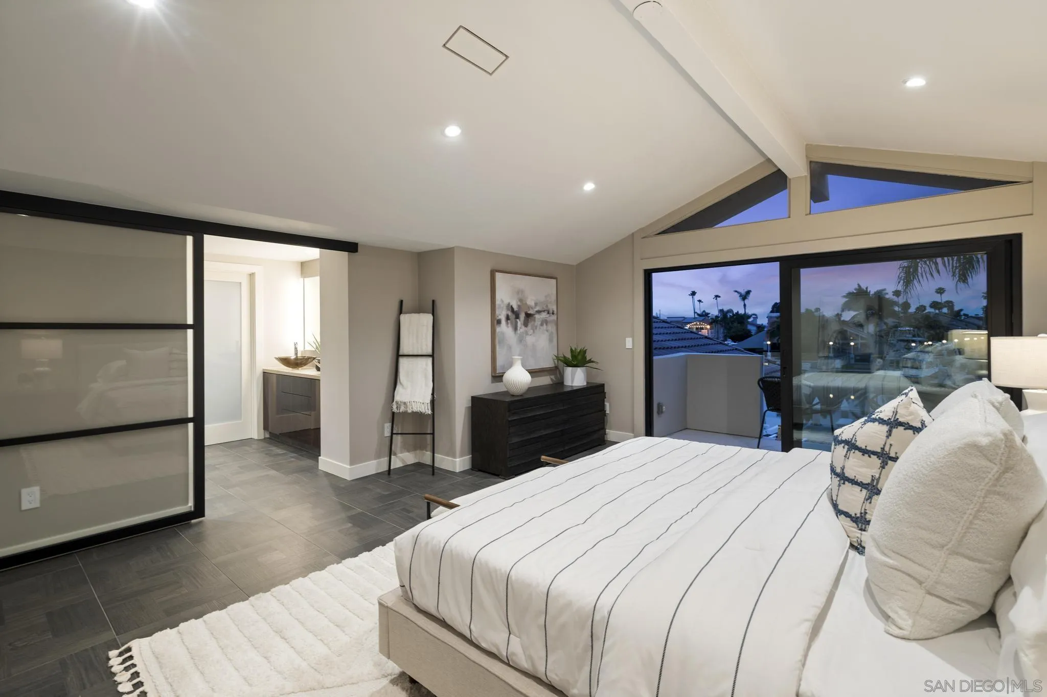 41 Blue Anchor Cay Road Coronado, CA 92118 - Photo 54 of 74 a bed room with a bed and a large mirror
