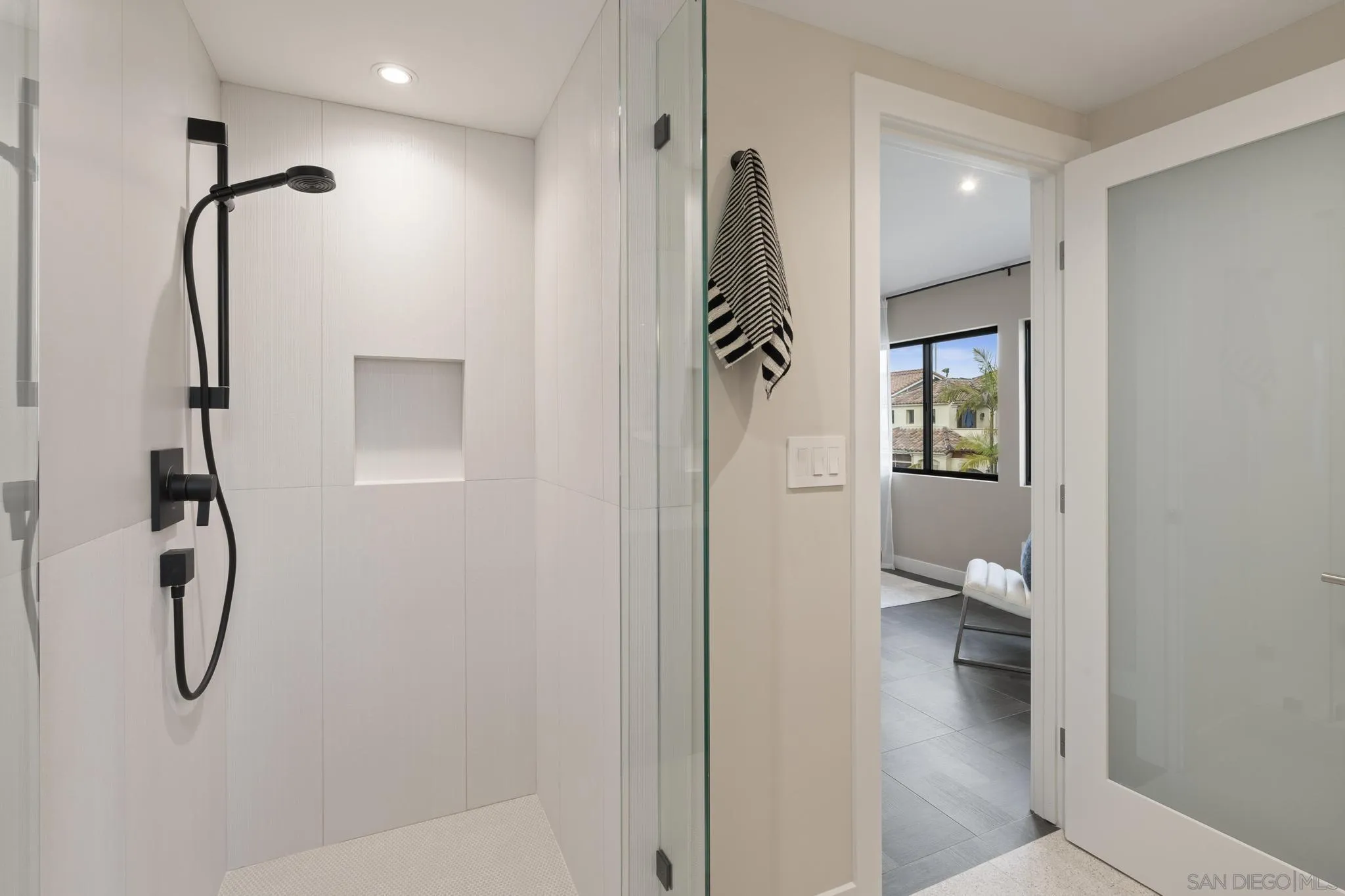 41 Blue Anchor Cay Road Coronado, CA 92118 - Photo 64 of 74 a bathroom with a shower