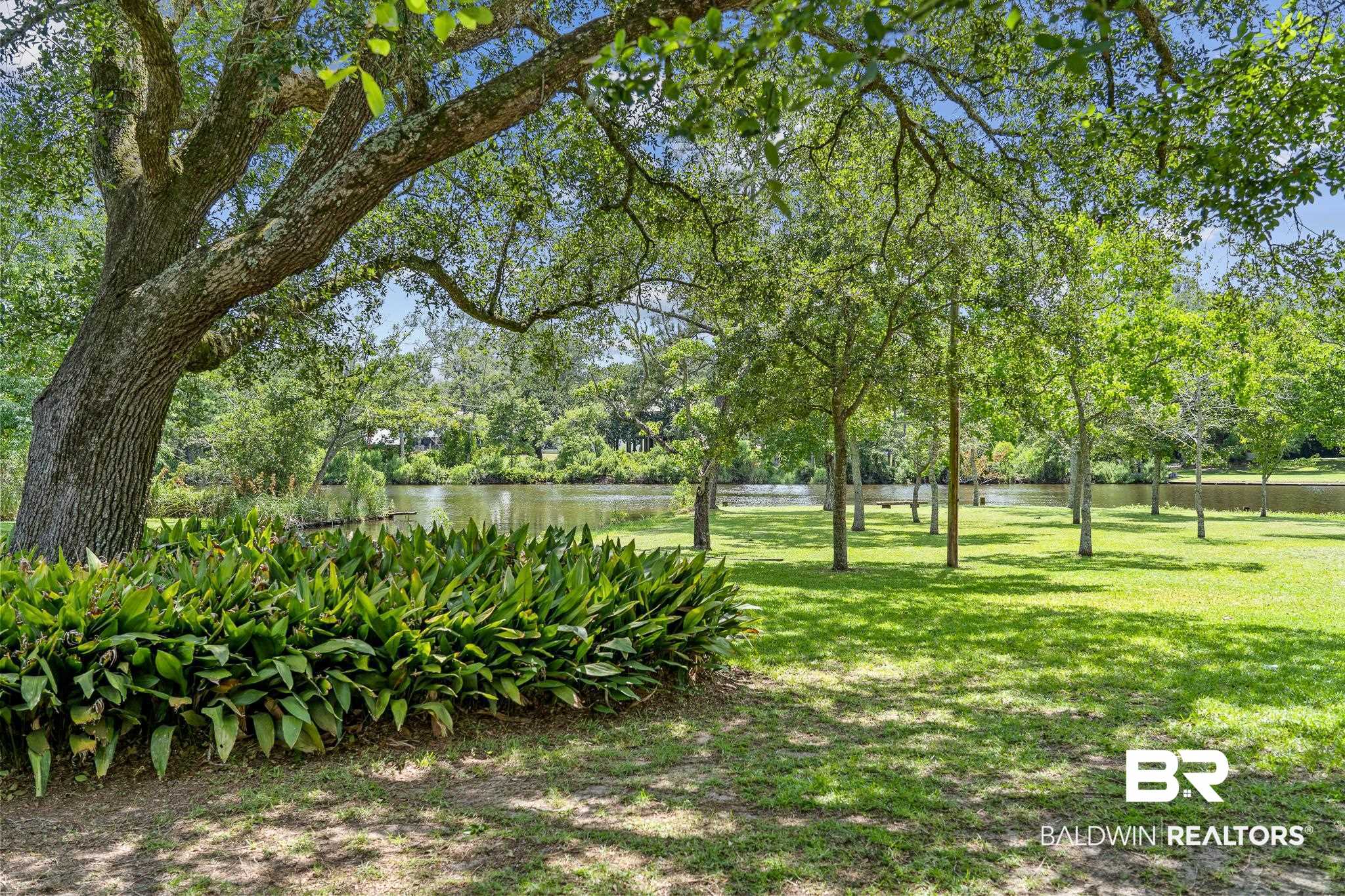 18513 Yacht Club Road Foley, AL 36535 - Photo 28 of 53 View of yard with a water view
