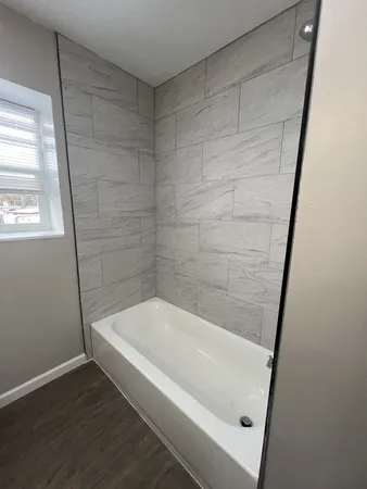a bathroom with a bathtub