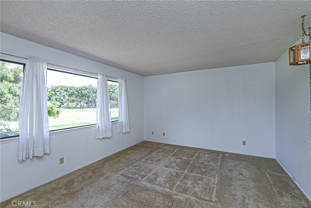 66 Stanford Circle Lompoc, CA 93436 - Photo 13 of 29 an empty room with windows
