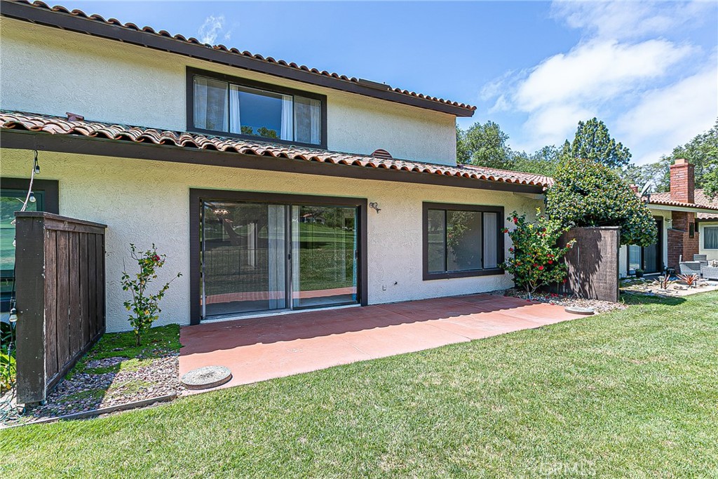 66 Stanford Circle Lompoc, CA 93436 - Photo 21 of 29 front view of a house with a yard