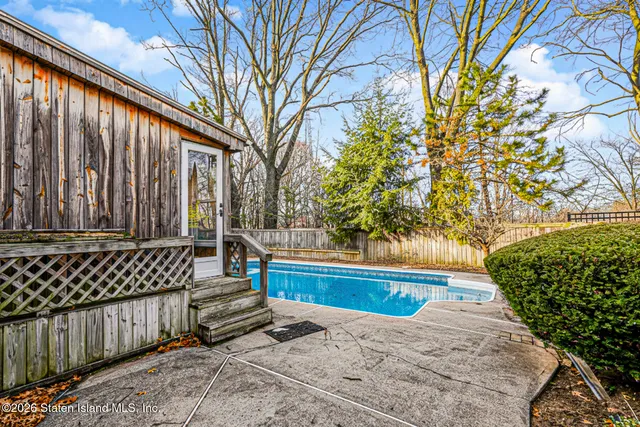 a view of a back yard of the house