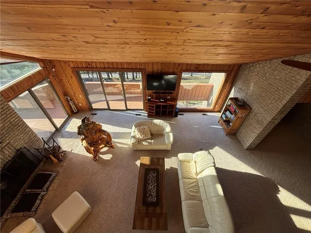 a view of a balcony with chairs