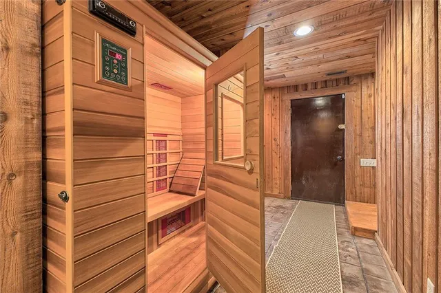 a bathroom with a bathtub and shower