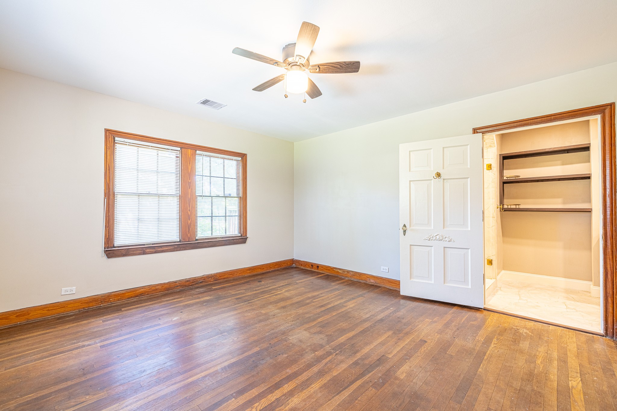 8548 Findlay Street Houston, TX 77017 - Photo 25 of 50 wooden floor in an empty room with a window