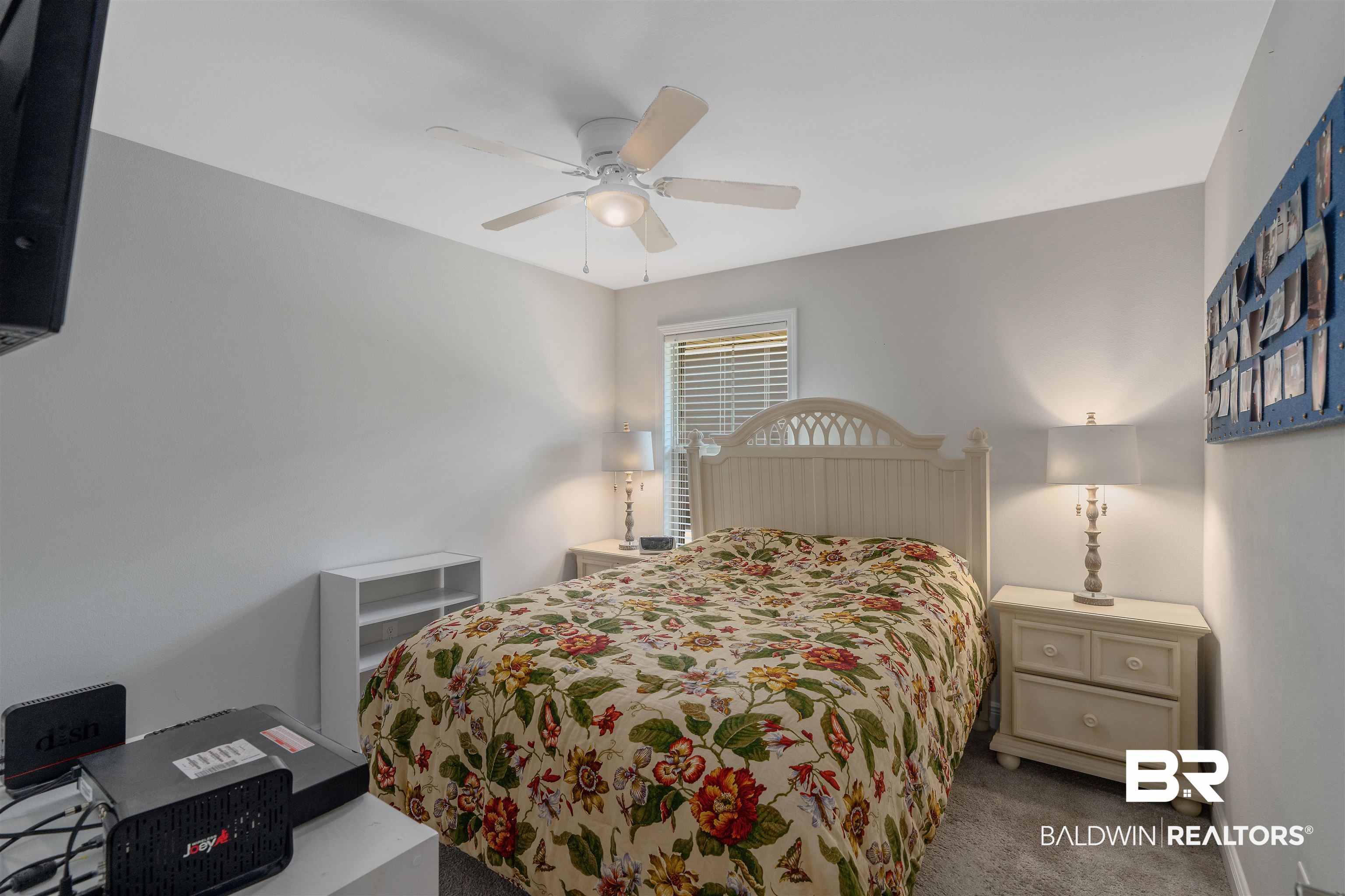 8823 Allay Lane Foley, AL 36535 - Photo 13 of 18 Carpeted bedroom with ceiling fan