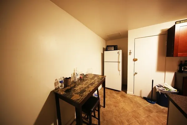 a view of a workspace with furniture