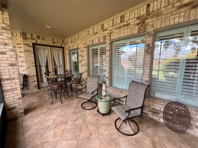 a view of a livingroom with furniture and window