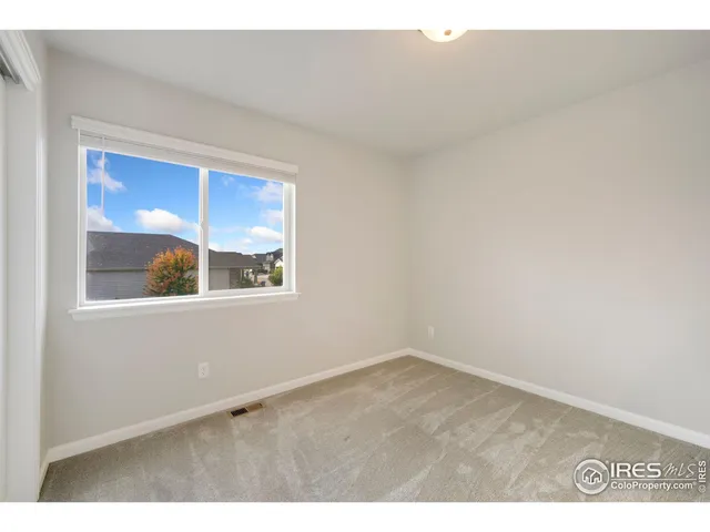 a view of an empty room with window