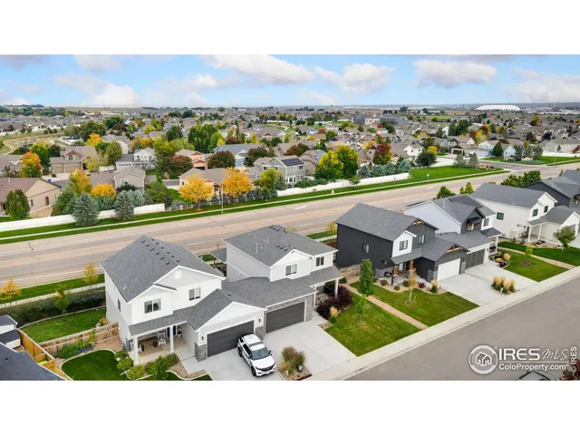 an aerial view of a house with a garden