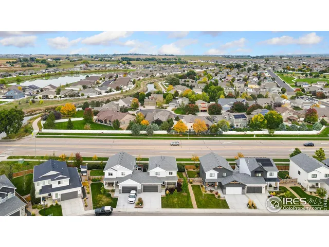 an aerial view of a building with outdoor seating