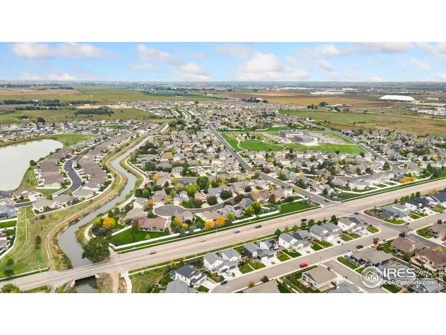 an aerial view of residential building and ocean