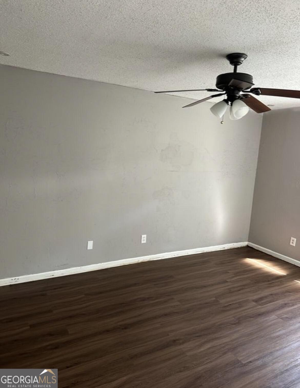 2725 Flintlock Place Austell, GA 30106 - Photo 13 of 28 a view of an empty room with wooden floor