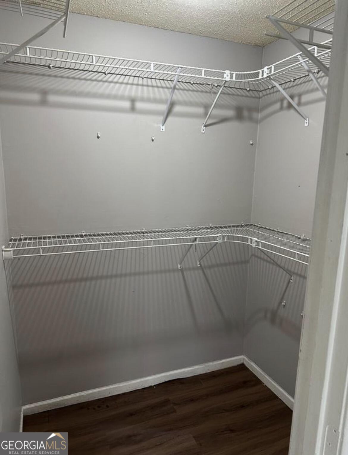 2725 Flintlock Place Austell, GA 30106 - Photo 14 of 28 a view of a room with racks on the wall