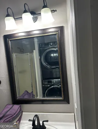 a bathroom with a toilet and a sink