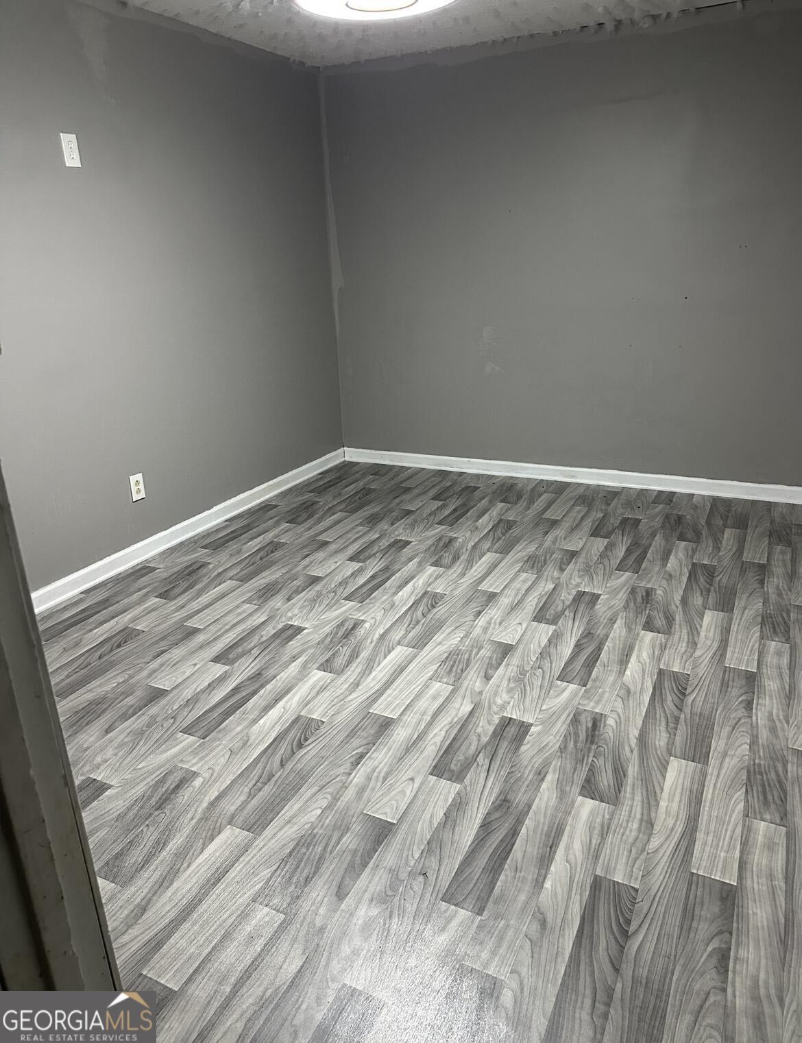 2725 Flintlock Place Austell, GA 30106 - Photo 28 of 28 a view of room with wooden floor