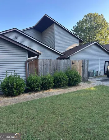 a house that has a lot of plants in it