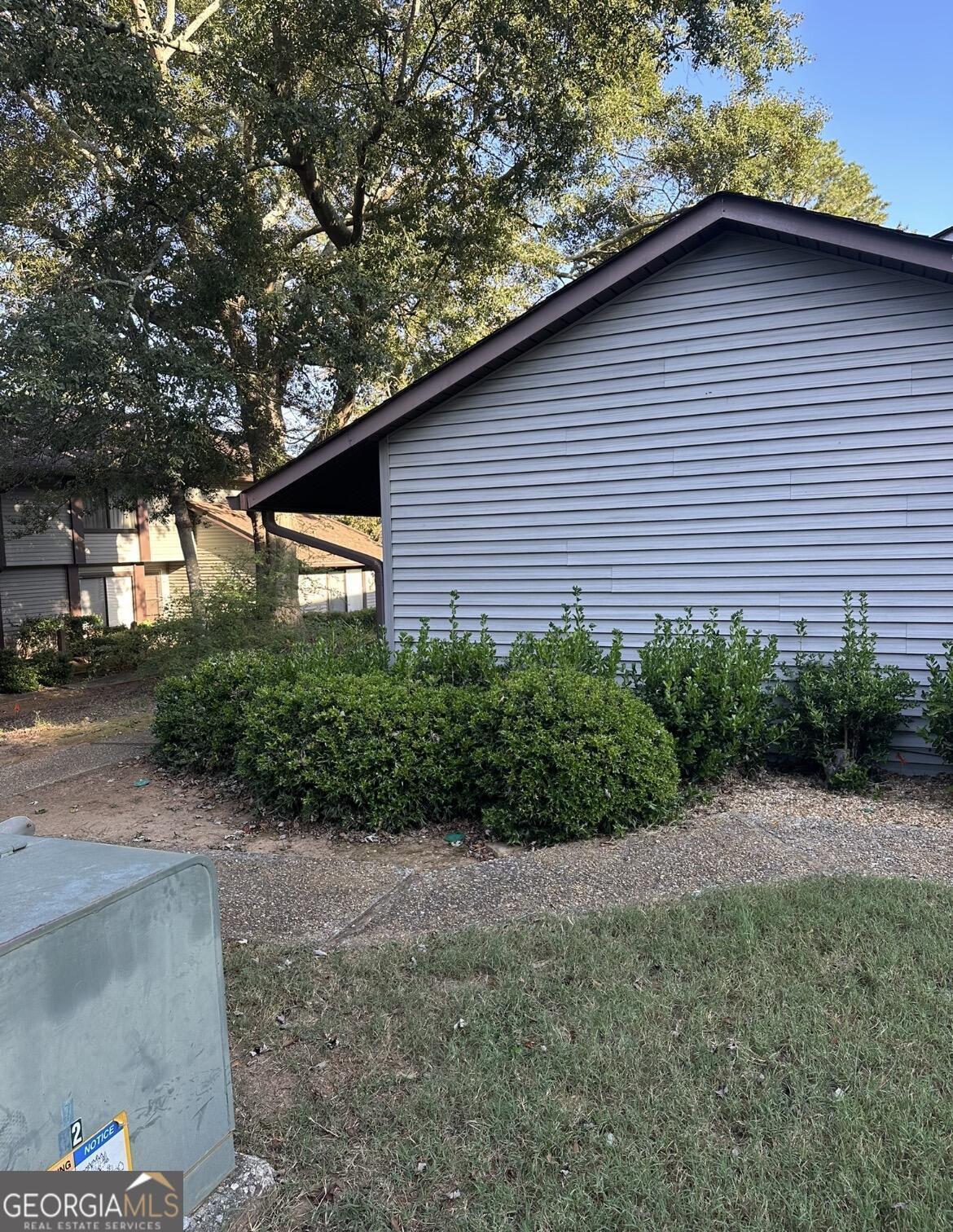 2725 Flintlock Place Austell, GA 30106 - Photo 5 of 28 a backyard of a house with lots of green space