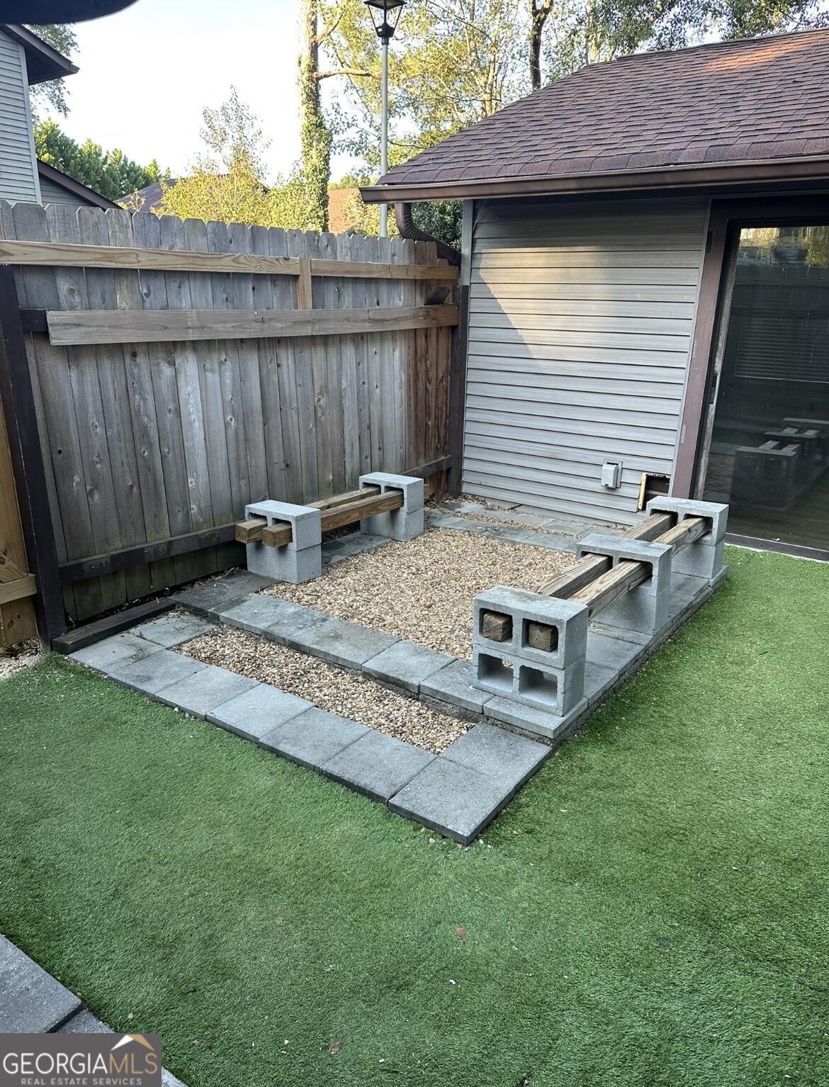 2725 Flintlock Place Austell, GA 30106 - Photo 6 of 28 a view of a backyard with a patio
