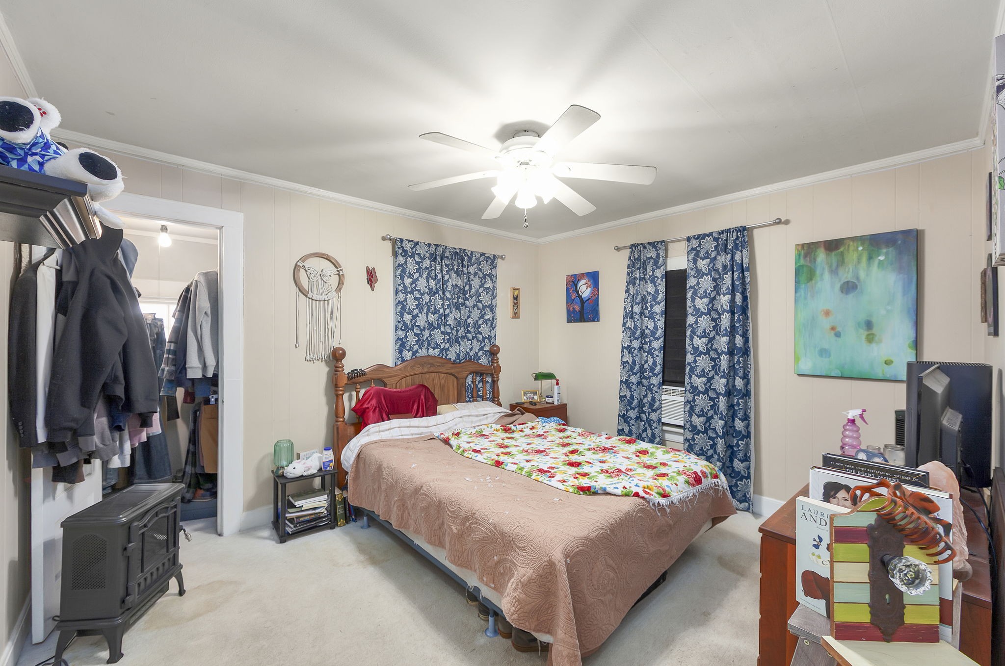 9000 Teague Road Medon, TN 38356 - Photo 13 of 22 a bedroom with a bed and a chandelier