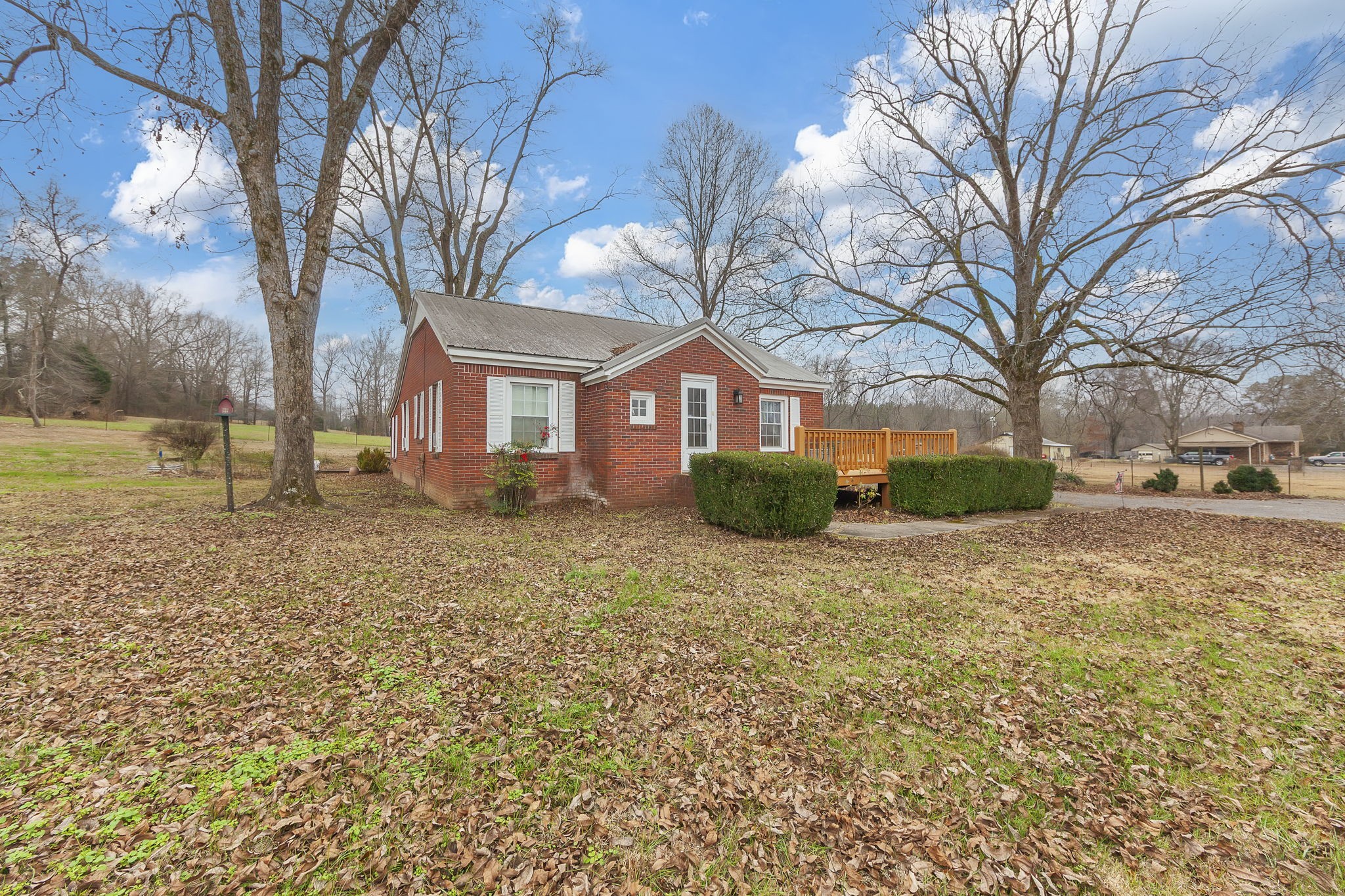 9000 Teague Road Medon, TN 38356 - Photo 3 of 22 a house with trees in front of it