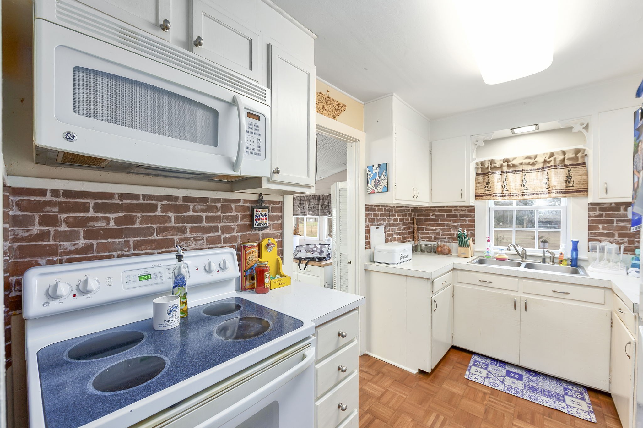 9000 Teague Road Medon, TN 38356 - Photo 9 of 22 a kitchen with a sink stove and cabinets