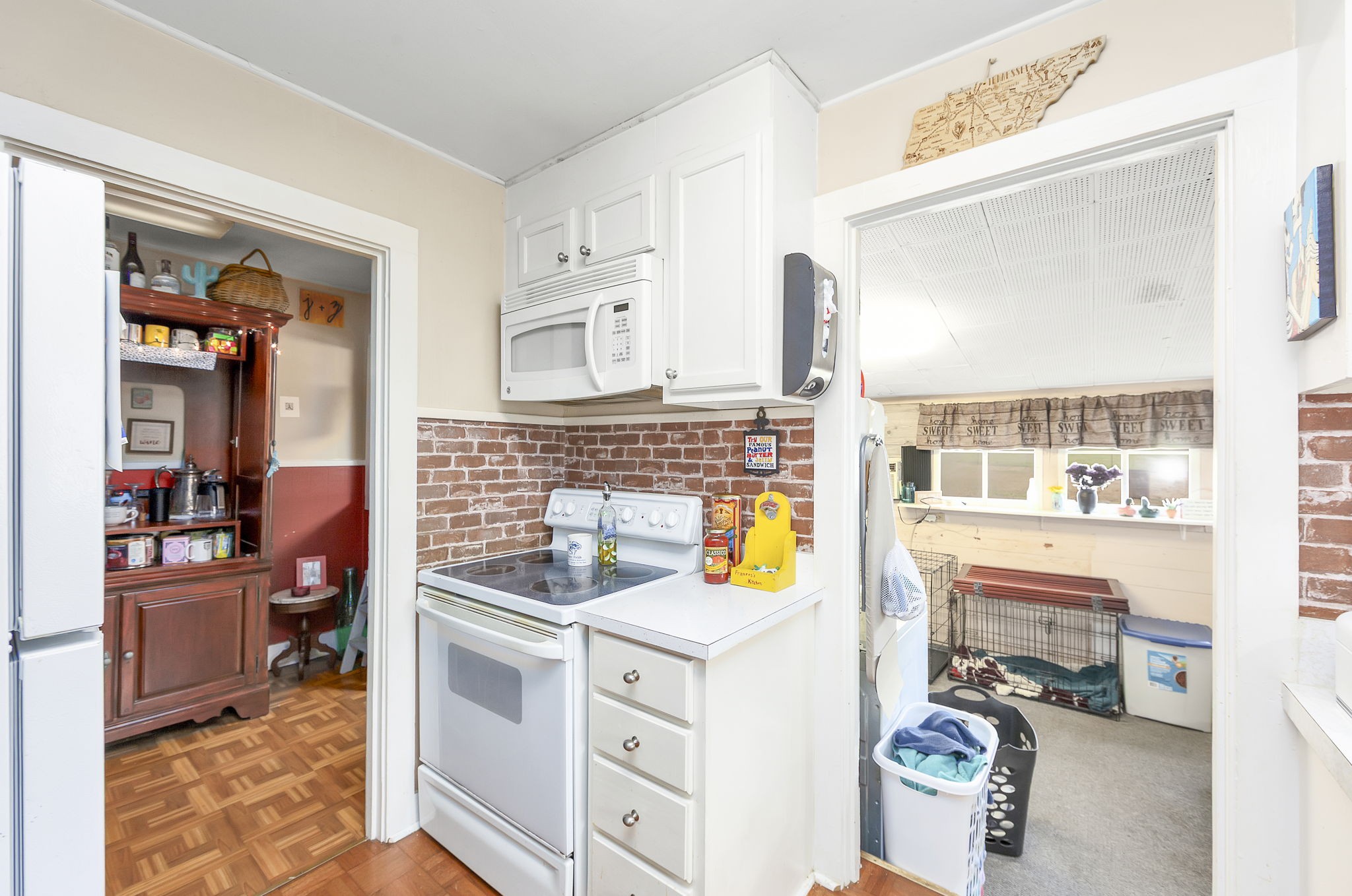 9000 Teague Road Medon, TN 38356 - Photo 10 of 22 a kitchen with a stove and a refrigerator