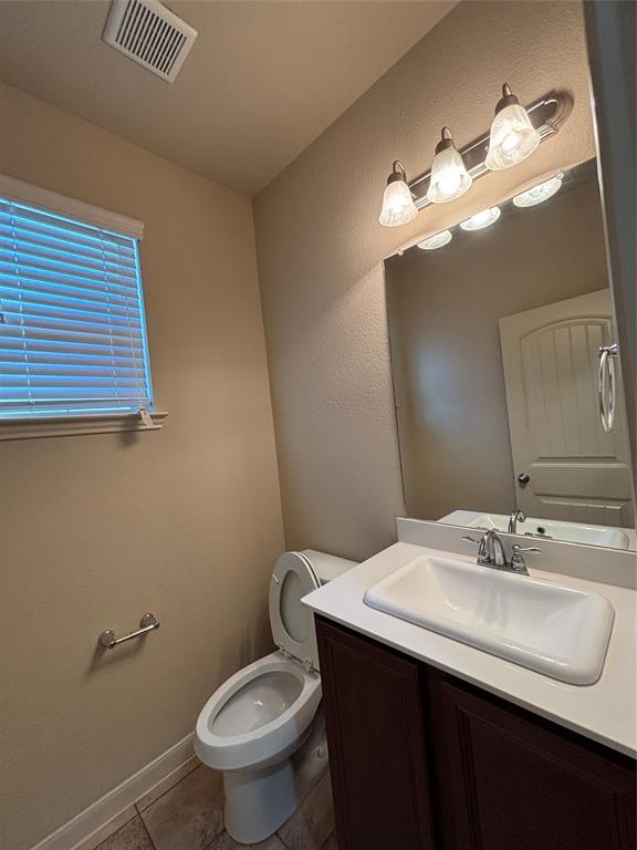 9435 Smoke Tree Drive Forney, TX 75126 - Photo 12 of 36 a bathroom with a sink and a mirror