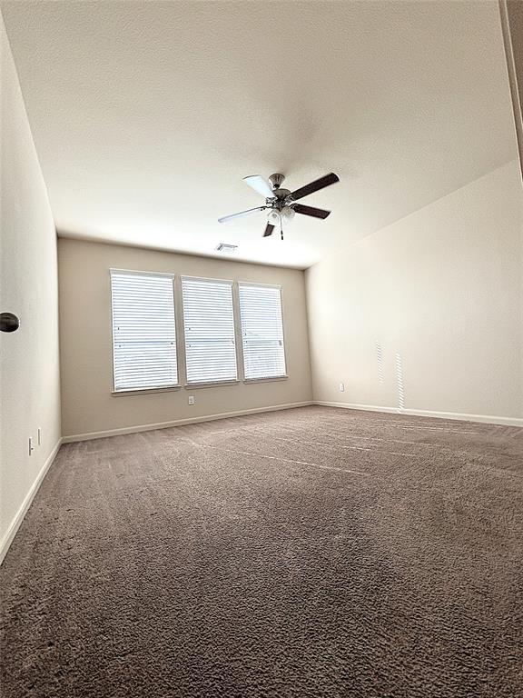 9435 Smoke Tree Drive Forney, TX 75126 - Photo 14 of 36 a view of an empty room with a window