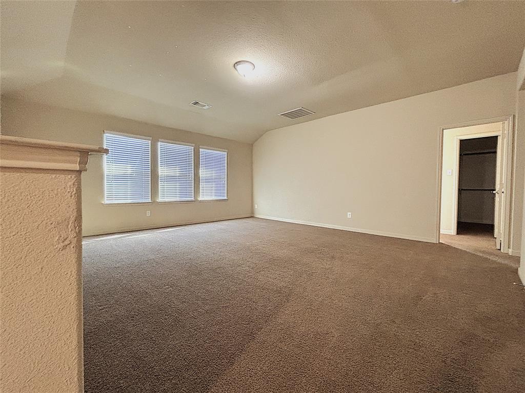 9435 Smoke Tree Drive Forney, TX 75126 - Photo 22 of 36 a view of an empty room with a window