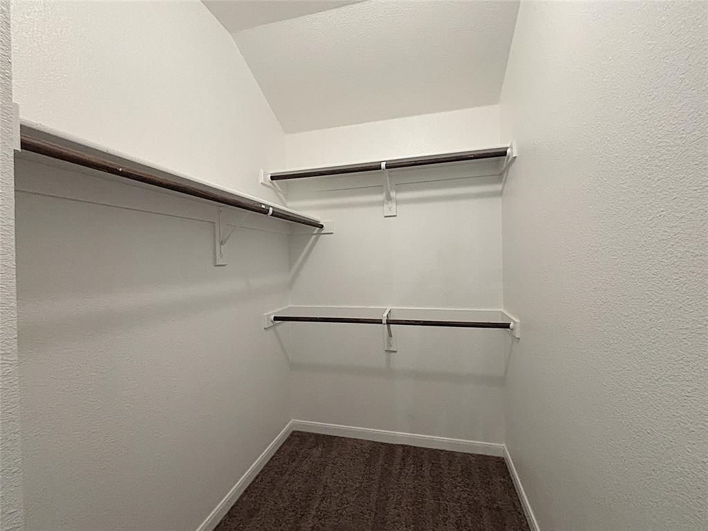 9435 Smoke Tree Drive Forney, TX 75126 - Photo 25 of 36 a view of an empty walk in closet
