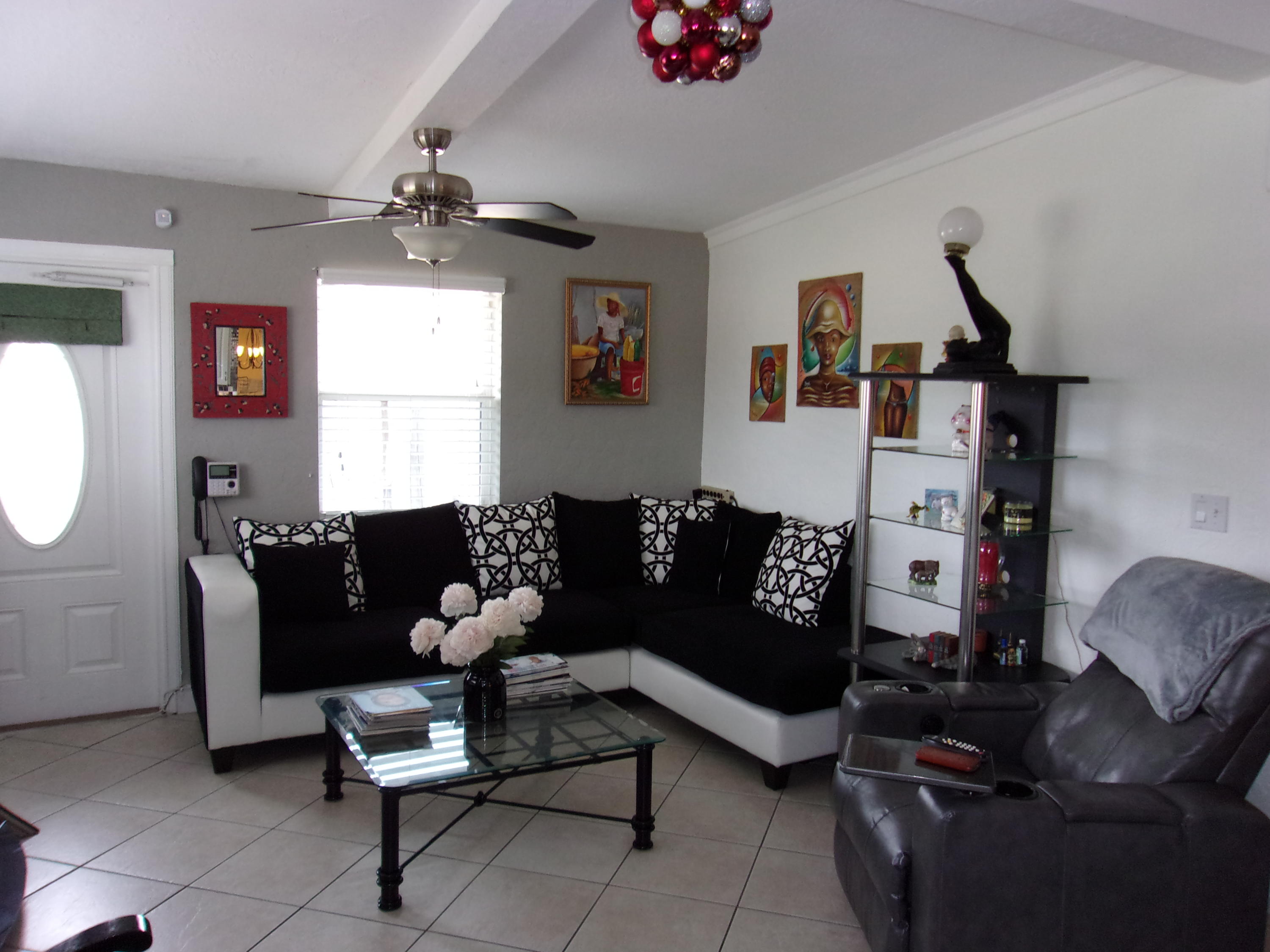5588 South Rue Road West Palm Beach, FL 33415 - Photo 16 of 29 a living room with furniture and a window