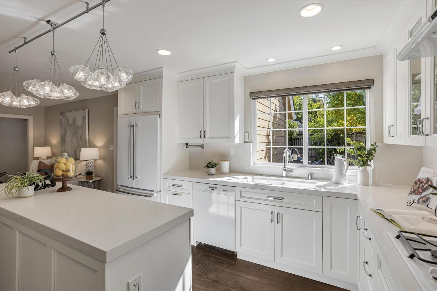 1716 Grizilo Drive San Jose, CA 95124 - Photo 12 of 49 a kitchen with cabinets a sink and appliances
