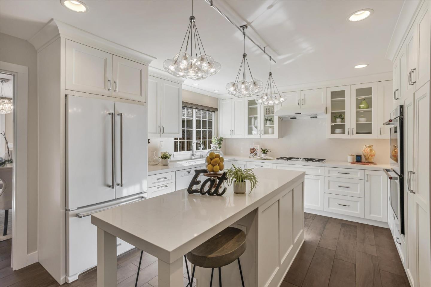 1716 Grizilo Drive San Jose, CA 95124 - Photo 13 of 49 a kitchen with stainless steel appliances a sink stove and refrigerator