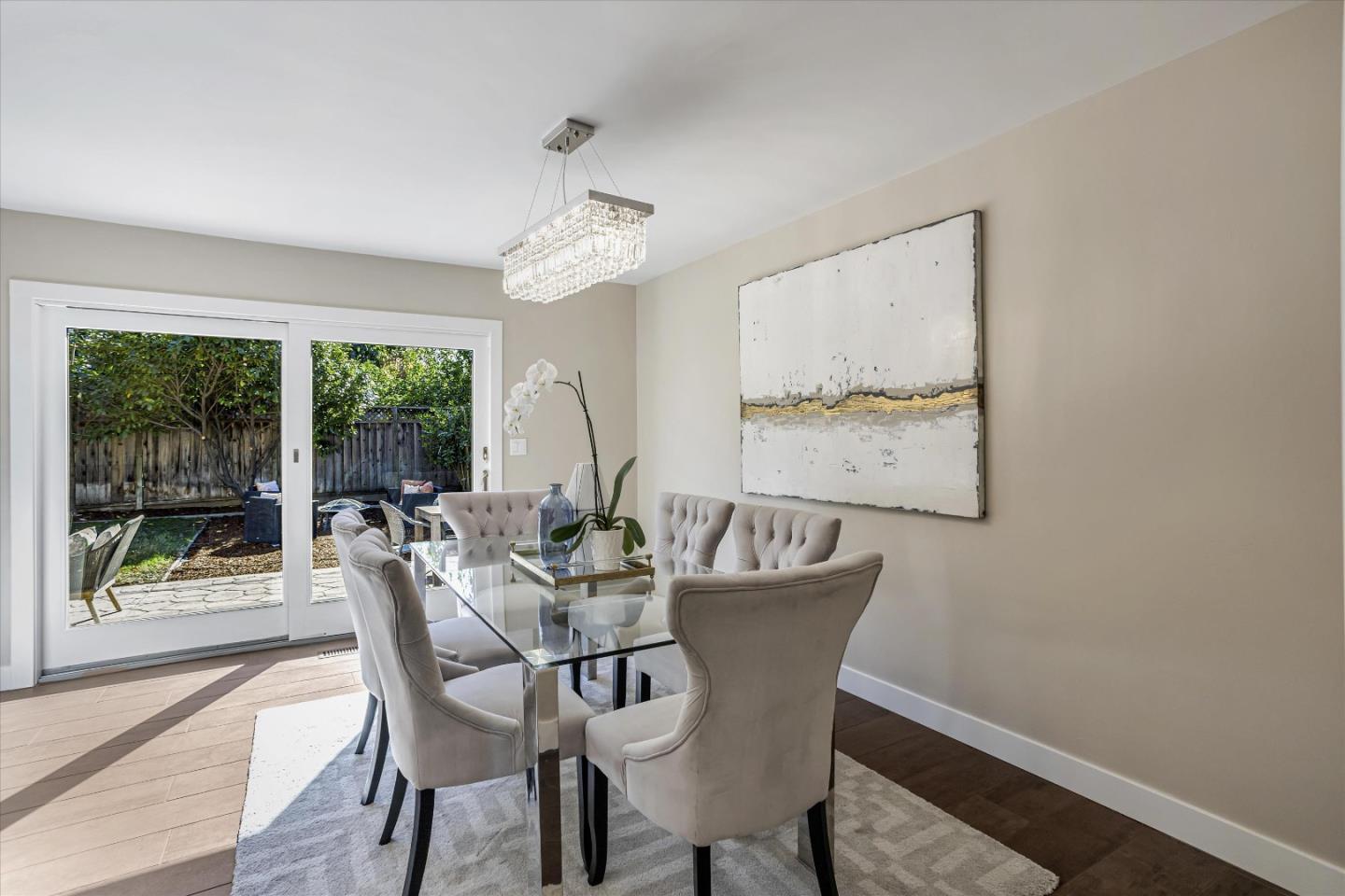 1716 Grizilo Drive San Jose, CA 95124 - Photo 14 of 49 a view of a dining room with furniture window and outside view