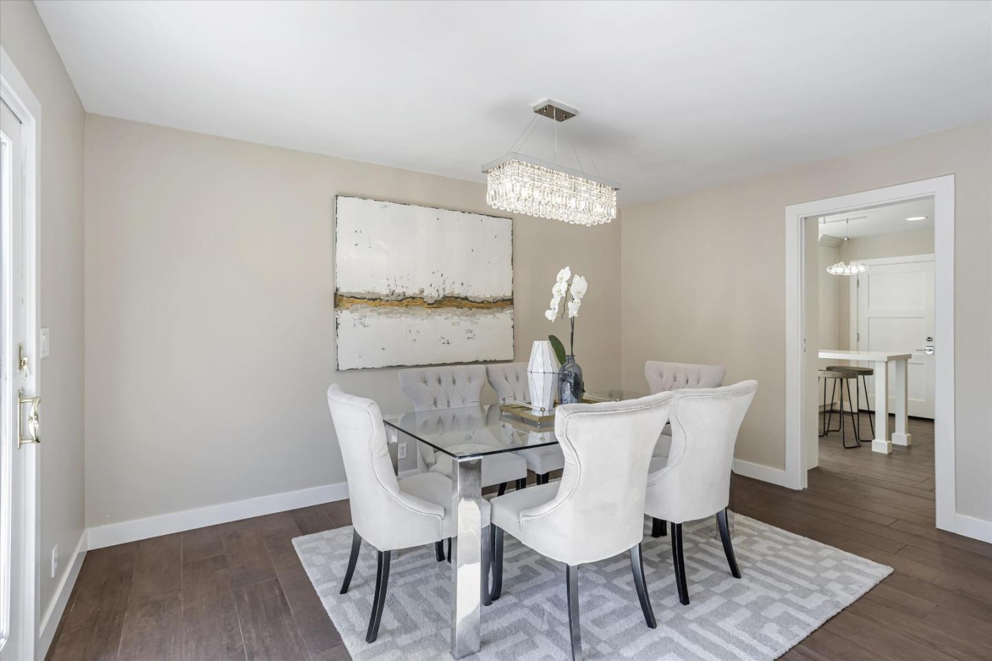 1716 Grizilo Drive San Jose, CA 95124 - Photo 15 of 49 a view of a dining room with furniture and wooden floor