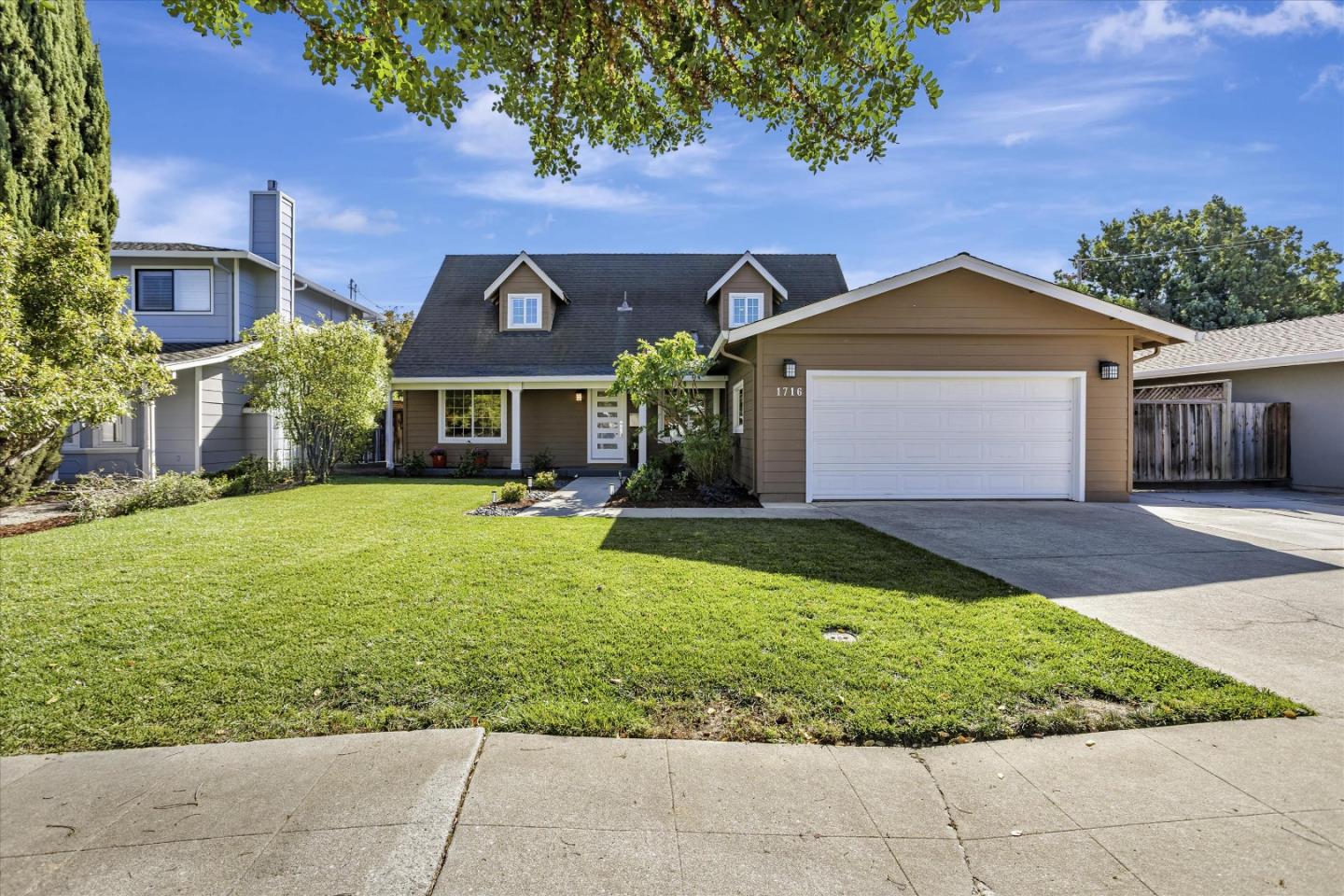 1716 Grizilo Drive San Jose, CA 95124 - Photo 2 of 49 front view of a house with a yard